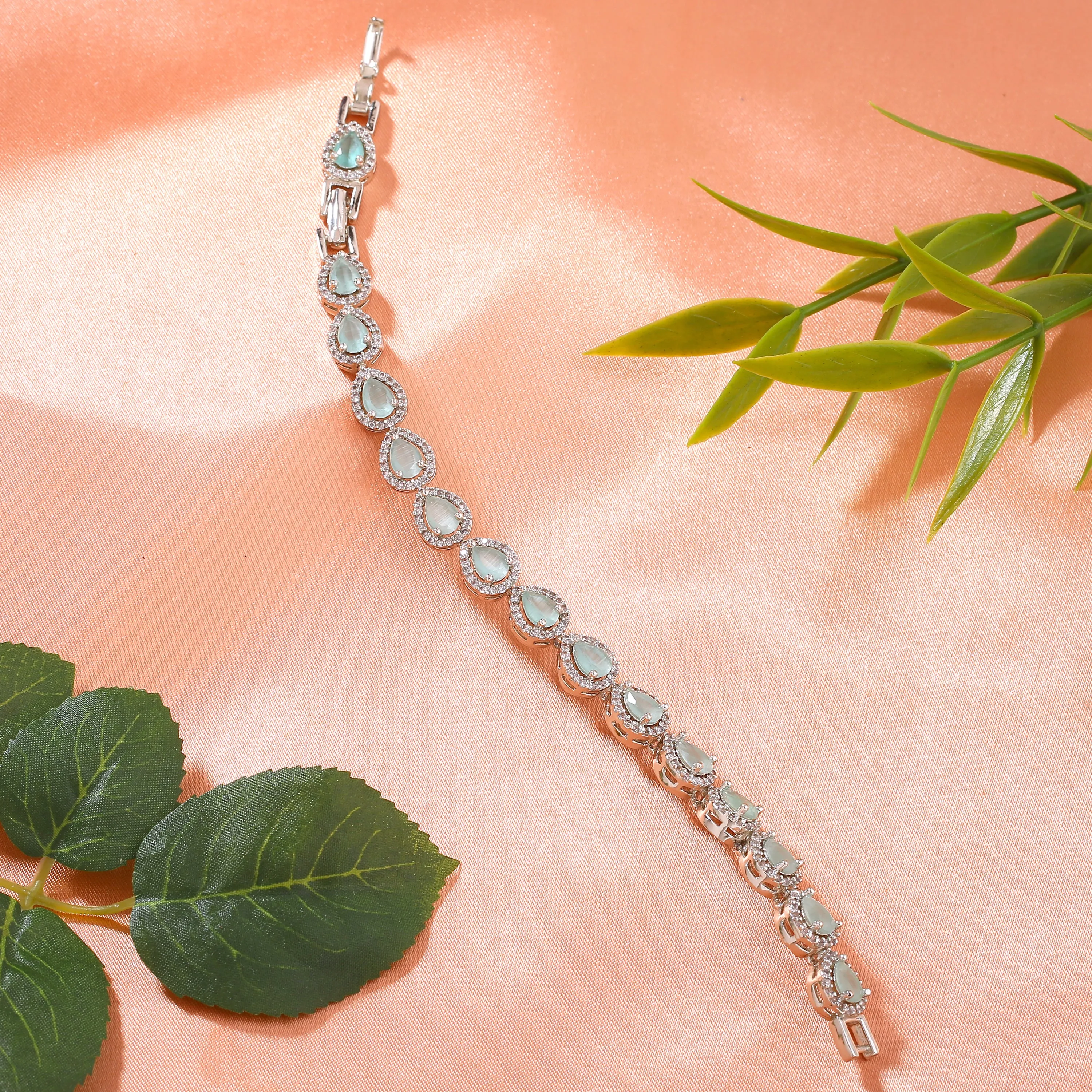 Estele Rhodium Plated CZ Classic Drop Designer Bracelet with Mint Green Stones for Women